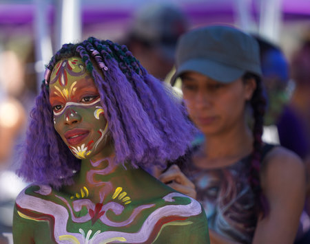 NEW YORK - JULY 24, 2022: Artists paint fully nude models of all shapes and sizes during 9th NYC Body Painting Day featuring artist Andy Golub at Union Square in New Yorkのeditorial素材