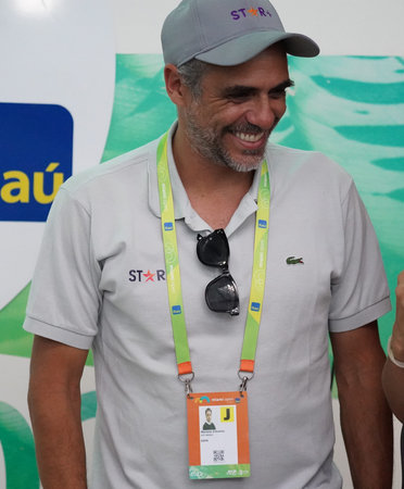 MIAMI GARDENS, FLORIDA - APRIL 1, 2022: Retired professional tennis player Mariano Zabaleta of Argentina comments 2022 Miami Open match at the Hard Rock Stadium in Miami Gardens, Fのeditorial素材