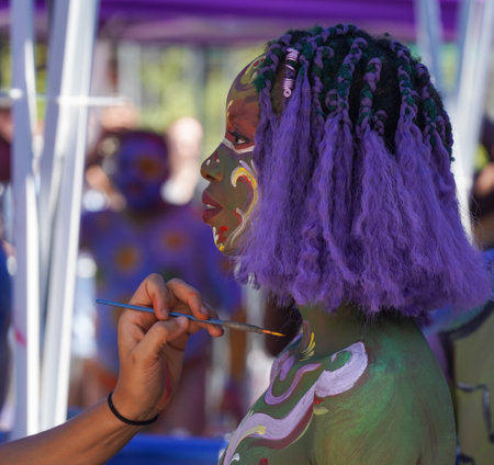NEW YORK - JULY 24, 2022: Artists paint fully nude models of all shapes and sizes during 9th NYC Body Painting Day featuring artist Andy Golub at Union Square in New Yorkのeditorial素材