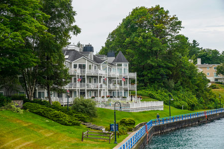 CHARLEVOIX, MICHIGAN - AUGUST 3, 2022: Luxury condominium at the Pine River Channel in Charlevoix, Michiganのeditorial素材