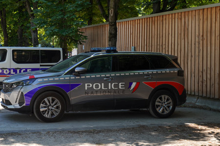 PARIS, FRANCE - JUNE 2, 2022: National police car provides security at the Avenue des Champs-Elysees in Paris.The National Police is the country's main civil law enforcement agencyのeditorial素材