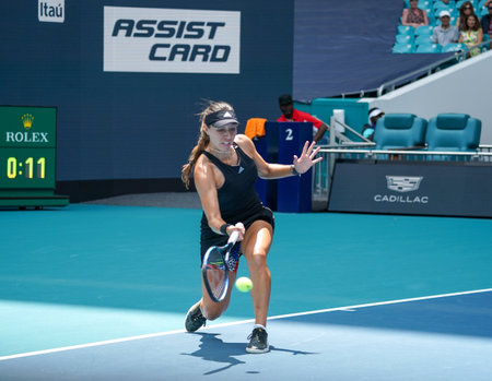 MIAMI GARDENS, FLORIDA - MARCH 30, 2022: Professional tennis player Jessica Pegula of USA in action during Miami Open 2022 quarter-final match at the Hard Rock Stadium in Miamiのeditorial素材