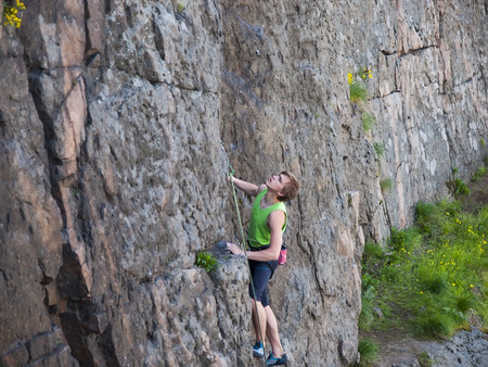 A man has been climbing on the rocks and enjoy life.の写真素材