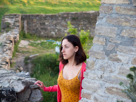 Young and beautiful girl dressed in Oriental style in the castle.の写真素材