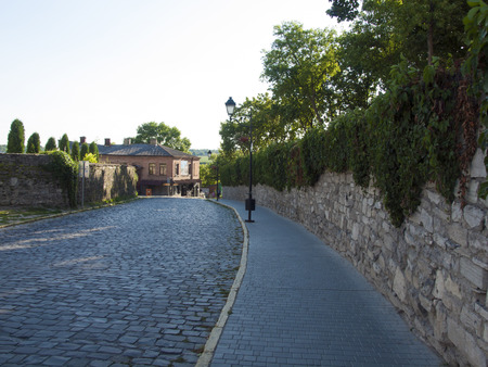 Empty road in the ancient city built of old pavers.の写真素材