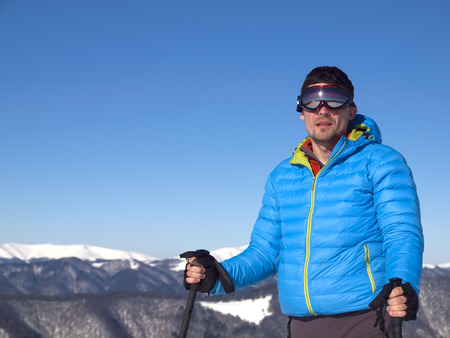 Portrait of a young man resting in the mountains in good weather.の写真素材