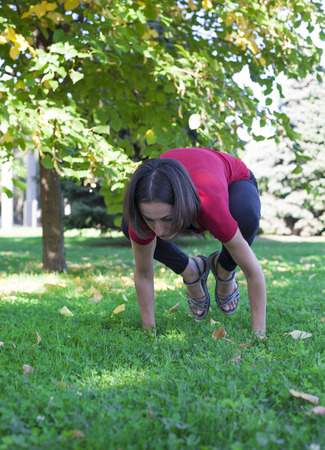 Girl doing yoga in the early morning.の写真素材