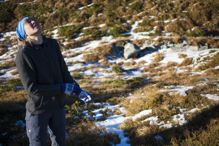 Woman engaged in fitness in the mountains.の写真素材