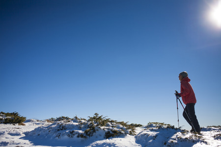 Woman engaged in fitness in the mountains.の写真素材