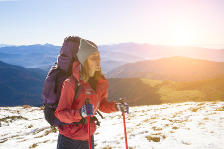 Tourist with a backpack in the mountains.の写真素材