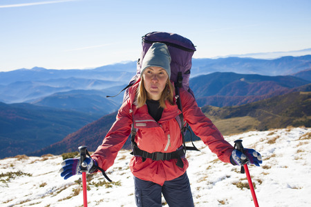 Active woman is traveling with a backpack.の写真素材