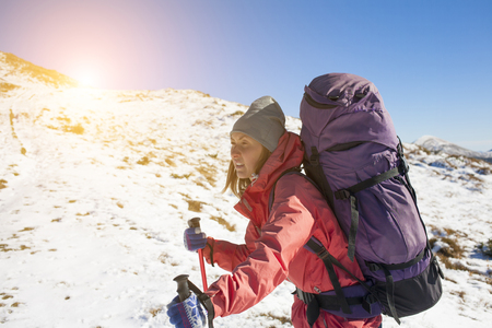 Active woman is traveling with a backpack.の写真素材