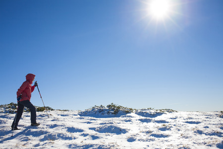 Young and beautiful girl in the mountains.の写真素材