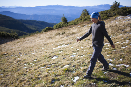 A young girl takes a walk in the fresh air.の写真素材