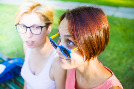 Two girls having fun in Park during holiday.の写真素材
