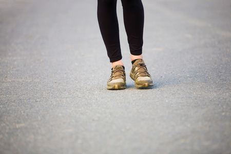 A tourist goes on the track. Playing sports in the fresh air.の写真素材