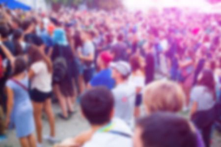 People having fun at the concert. The blur effect.の写真素材