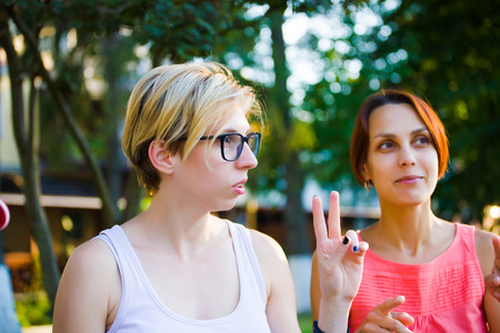 portrait of two girls, the fellowship of friends in nature.の写真素材