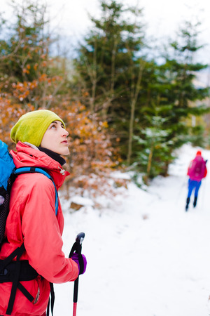 girl with a backpack in the woods, travel and sports.の写真素材