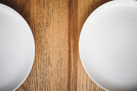 two plates are on the table in the restaurant. waiting for an order in a cafe.