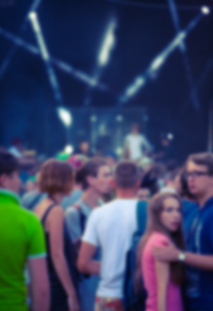 People having fun at the concert. The blur effect.の写真素材