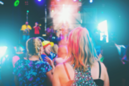 People having fun at the concert. The blur effect.の写真素材