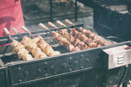 Meat on skewers. Street food. Fried pork. Eastern cuisine. Meat dish. Grilled lamb.の写真素材