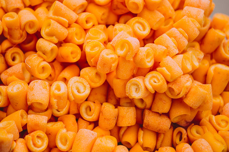 Candied orange peel. Candied fruits on the counter of the Turkish market. Rolled orange peel. Turkish sweets.の写真素材