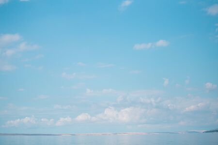 Sea and sky with clouds. Adriatic coast of Croatia. Calm sea surface.の写真素材
