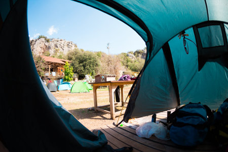 View from the tent. Place for a tent in a climbing camp. Travel and active lifestyle.