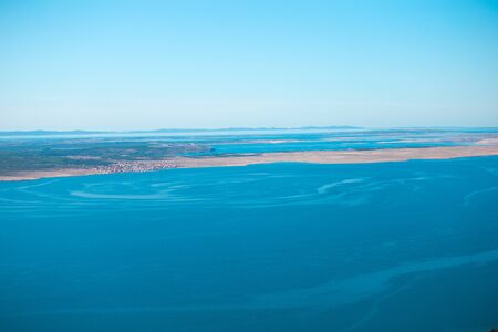 Croatia landscape and coast. Beautiful Adriatic Sea and mountains in the background.の写真素材