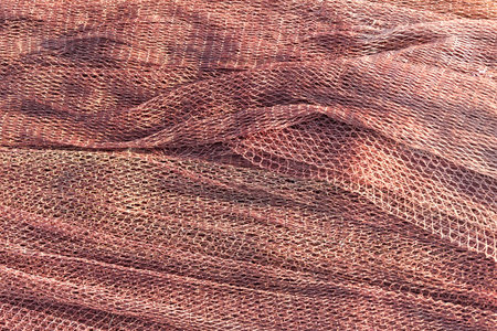 Fishing net close-up. Fishing equipment. Grid. Industrial fishing.