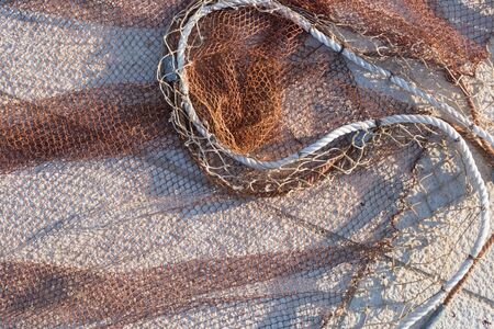 Fishing net close-up. Fishing equipment. Grid. Industrial fishing.の写真素材