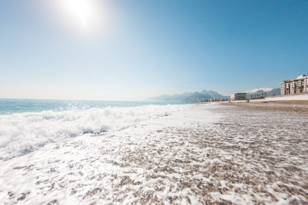 Beautiful sea waves. Ocean coast. Rest on the sandy coast. Sea foam.の写真素材