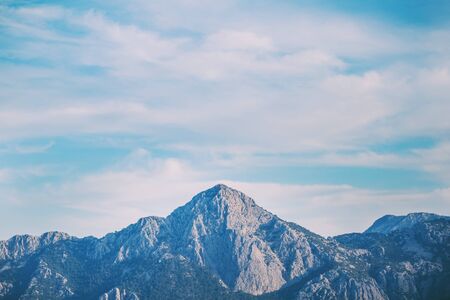 Beautiful Turkish mountains on a background of cloudy sky. Peak. Climbing in Turkey.の写真素材