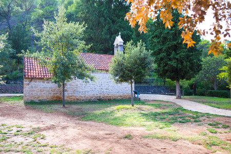 Old stone house in Croatia. The path to the house. The architectural style of the Croatian resort towns.の写真素材
