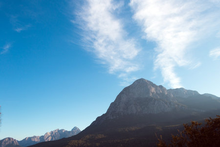 Turkish mountains against the blue sky with clouds, Mountain valley, Picturesque landscape,...