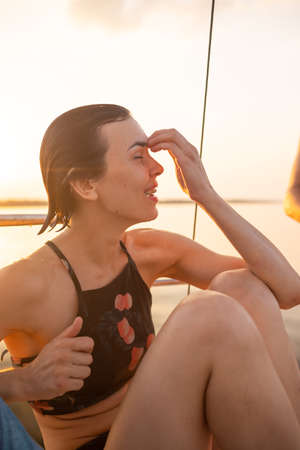 Portrait of a young girl. beautiful girl resting on a yacht. Travel and yachting conceptの写真素材