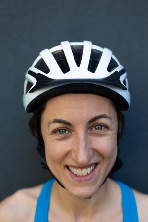 portrait of a sports girl in a bicycle helmet