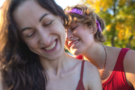 Two girls hug, lesbian couple spends time together, equality, tenderness in the relationship of two women, lgbtの写真素材
