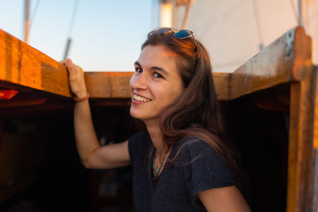 portrait of a young girl with glasses while traveling on a yacht