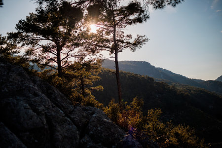 Beautiful Turkish mountains at sunset, picturesque nature, the rays of the setting sun, Turkey travelの写真素材