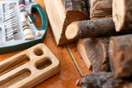 box with accessories for processing and engraving next to an electric tool. hobby and creativity.の写真素材