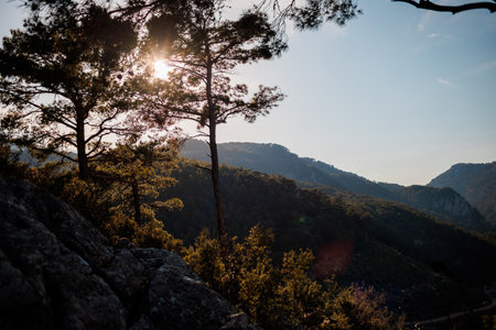 Beautiful Turkish mountains at sunset, picturesque nature, the rays of the setting sun, Turkey travelの写真素材
