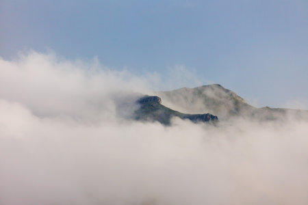 Passing clouds over a landscape in Turkey with mountain peaks in the background. Landscape of mountain range and mountains. mountaineering in Turkey. Dedegol. Turkey.の写真素材