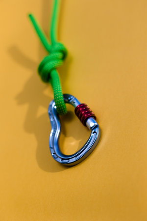 Steel carabiner with clutch. Equipment for climbing and mountaineering. safety rope.の写真素材