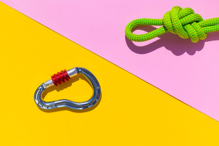 carabiner with rope. Equipment for climbing and mountaineering. safety rope. node eight. Minimal concept, copy space.の写真素材