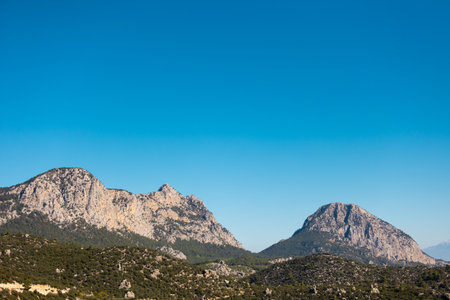 Beautiful Turkish mountains at sunset, picturesque nature, the rays of the setting sun, Turkey travelの写真素材