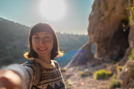 follow me. happy couple traveling. portrait of happy female tourist in mountains. girl smiling....