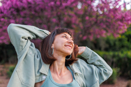 portrait of a happy girl. A young brunette is having a happy and fun time, the girl is smiling....
